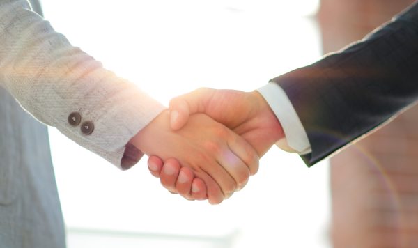 Handshaking Men