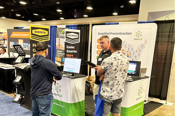 workers of talking to customers at the fair