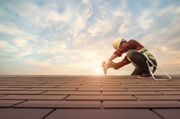 A Worker on Roofing Job